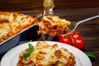 Portion Lasagna Closeup Wooden Backgound 1