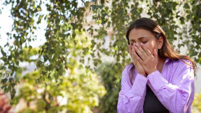 Woman Suffering From Allergies Outside 1