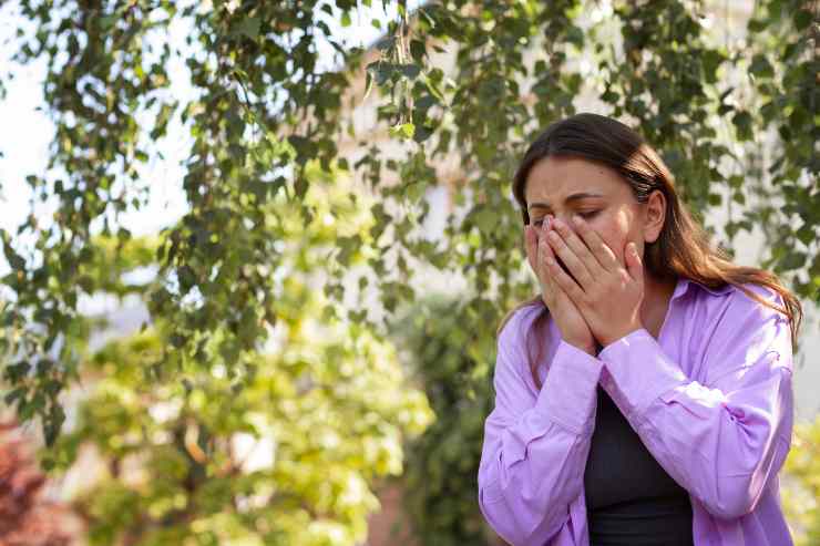 Woman Suffering From Allergies Outside 1