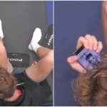 Jannik Sinner sorpreso con il cellulare in mano: sullo sfondo spunta Laila Hasanovic agli US Open 2025