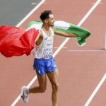 Iliass aouani conquista il bronzo nella maratona ai mondiali di tokyo 2025: la sua corsa tra difficoltà e speranze